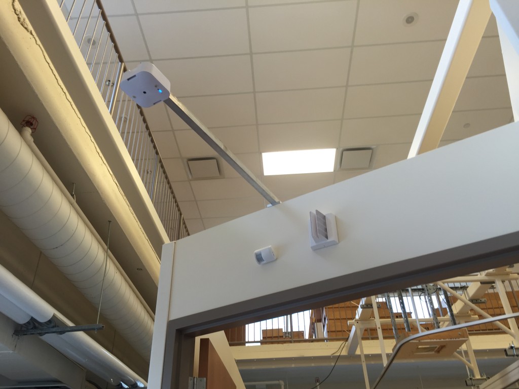 The sensor that is stationed above the entrance to a patient's room.