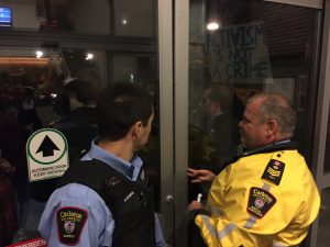 Security guards block protesters from entering Richcraft Hall during last Tuesday's protest. (Photo: Ruth Yohanes-Tecle)