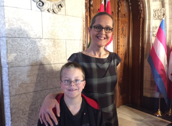 Advocate Marni Panas is here from Alberta with her son at the announcement to repeal of s.159 of the criminal code. | Photo - Ruth Tecle