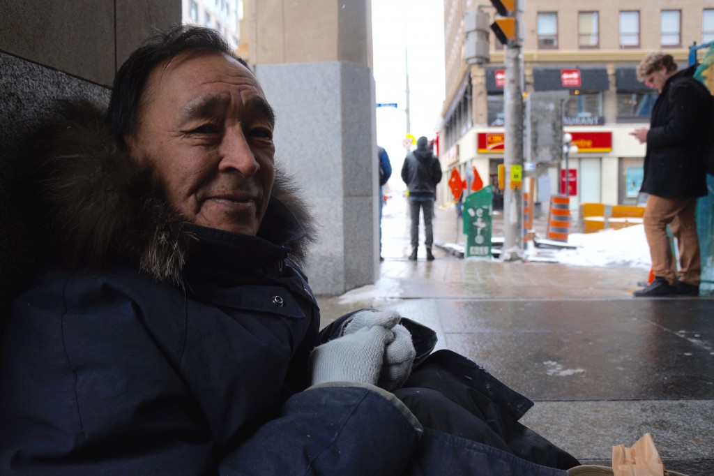 Tuqiqki Osuitok, 63, is a sculptor from Cape Dorset, Nunavut. Here he is just outside of Rideau Centre, on the corner of Rideau Street and Sussex Drive on February 9, 2016 at approximately 1:00 p.m.