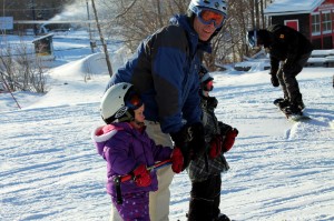 Skiing was a family affair for David Sutherland and his children Elsie and Max at Camp Fortune ski hill on Friday (Roberta Bell, The Impact)