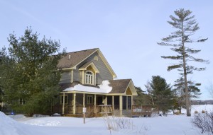 A typical cottage at the Muskokan during the wintertime. Each home has its own screen-in porch, deck, and barbecue to allow for privacy and the true "cottage feel." Erin Morawetz