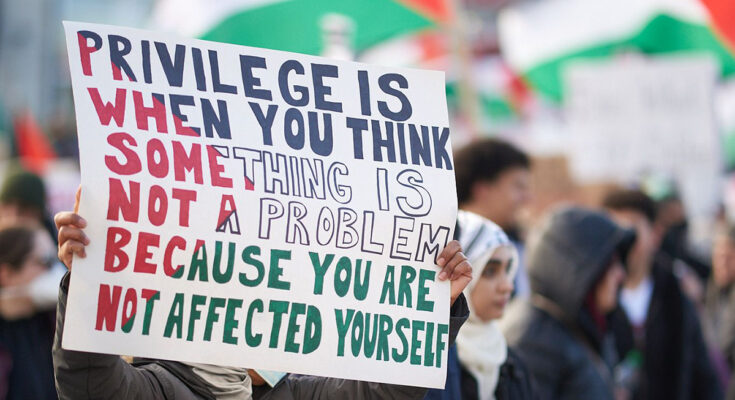 A sign at a demonstration that says "Privilege is when you think something is not a problem because you are not affected yourself"