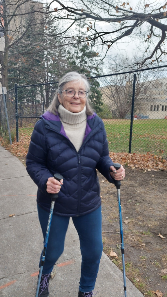 Sandra Stec outsides on an autumn day using her Nordic Walking Poles.