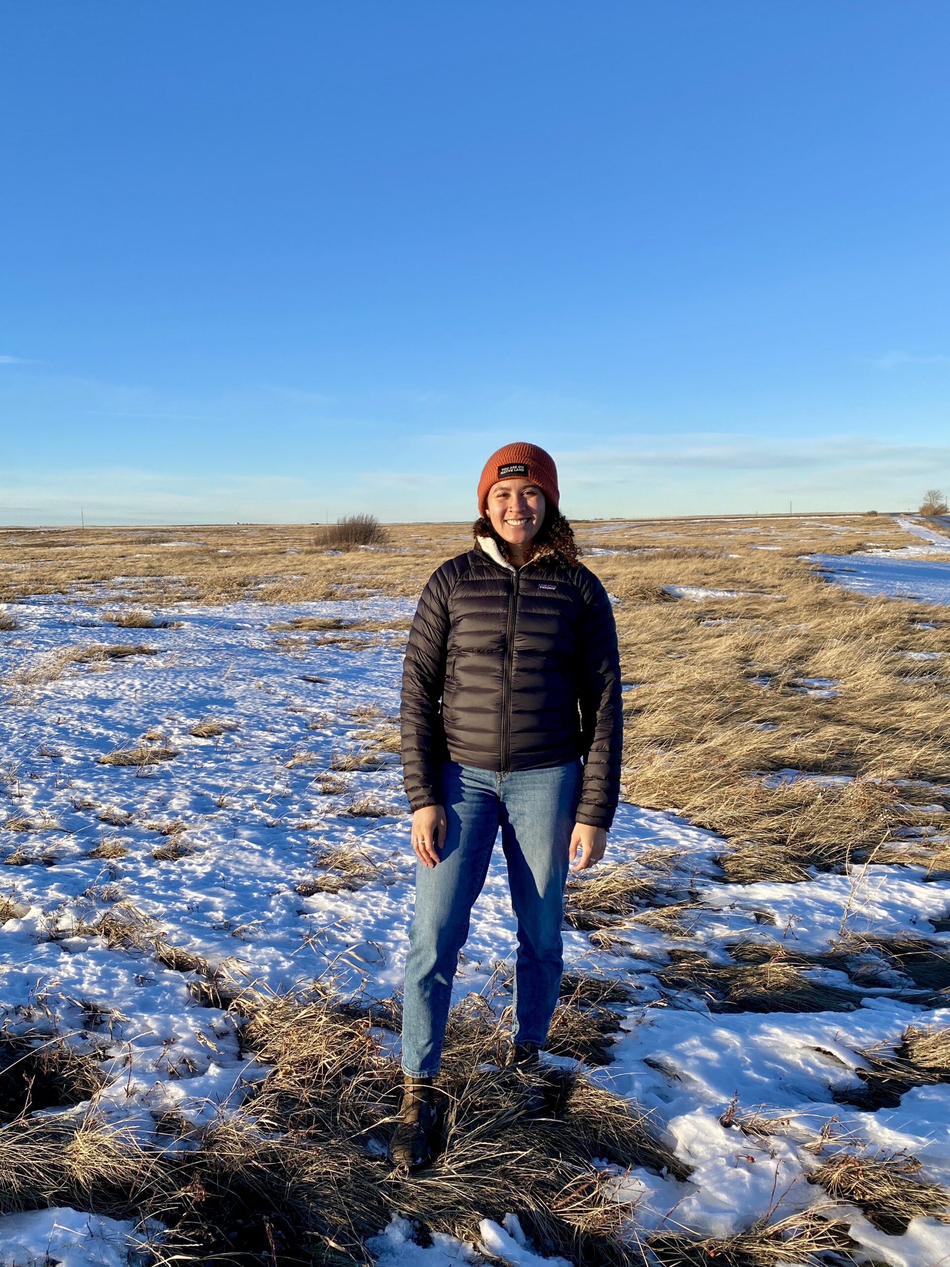 Joy SpearChief-Morris stands on the Kainai Blood Reserve, traditional lands to the Blackfoot Confederacy and grizzly bears.