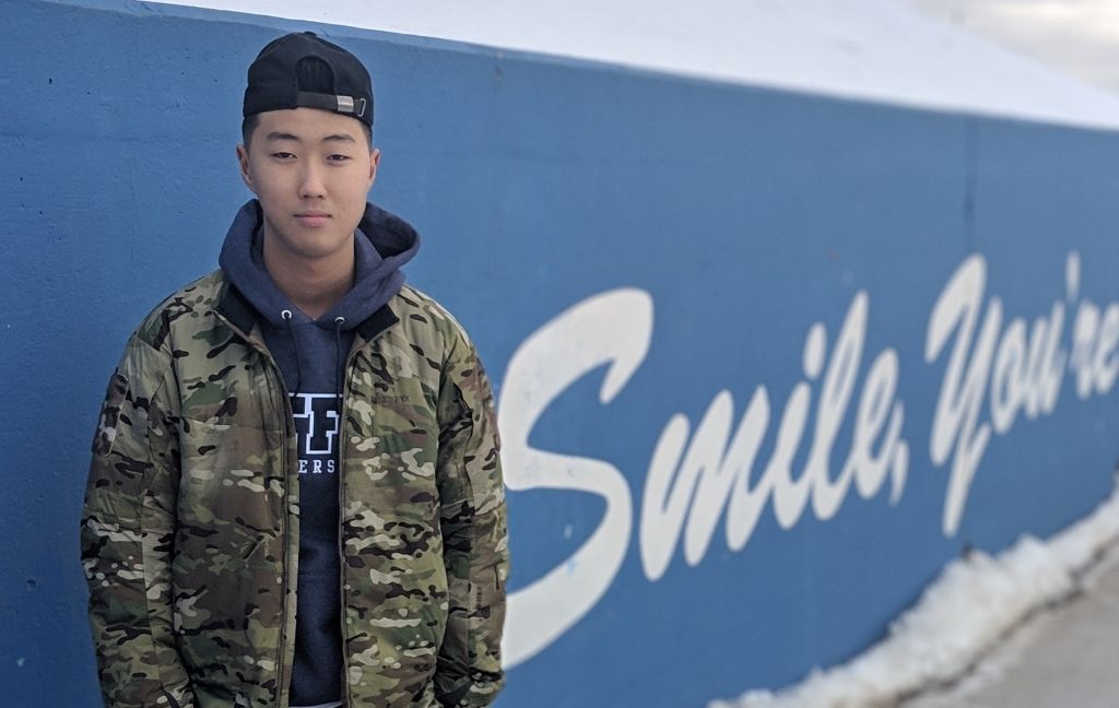 William Mulvihill, who grew up in Pembroke, recalls his own experiences of being discriminated against. He stands outside St. Francis Xavier University in Nova Scotia in 2018.