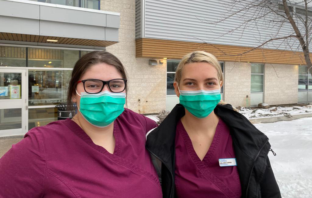 	Photo of fourth year nursing students Carling Gosselin and Melanie Cairns at Winnipeg’s Université de Saint-Boniface. Photo by Daena Coleman.